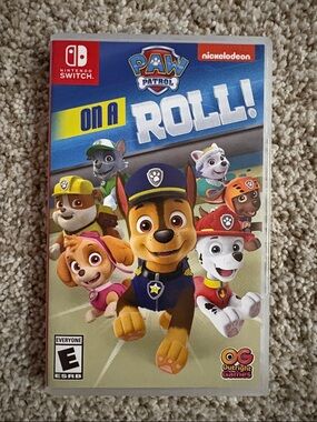 Paw Patrol On A Roll! Game Cover – Blue, Yellow, Red, White